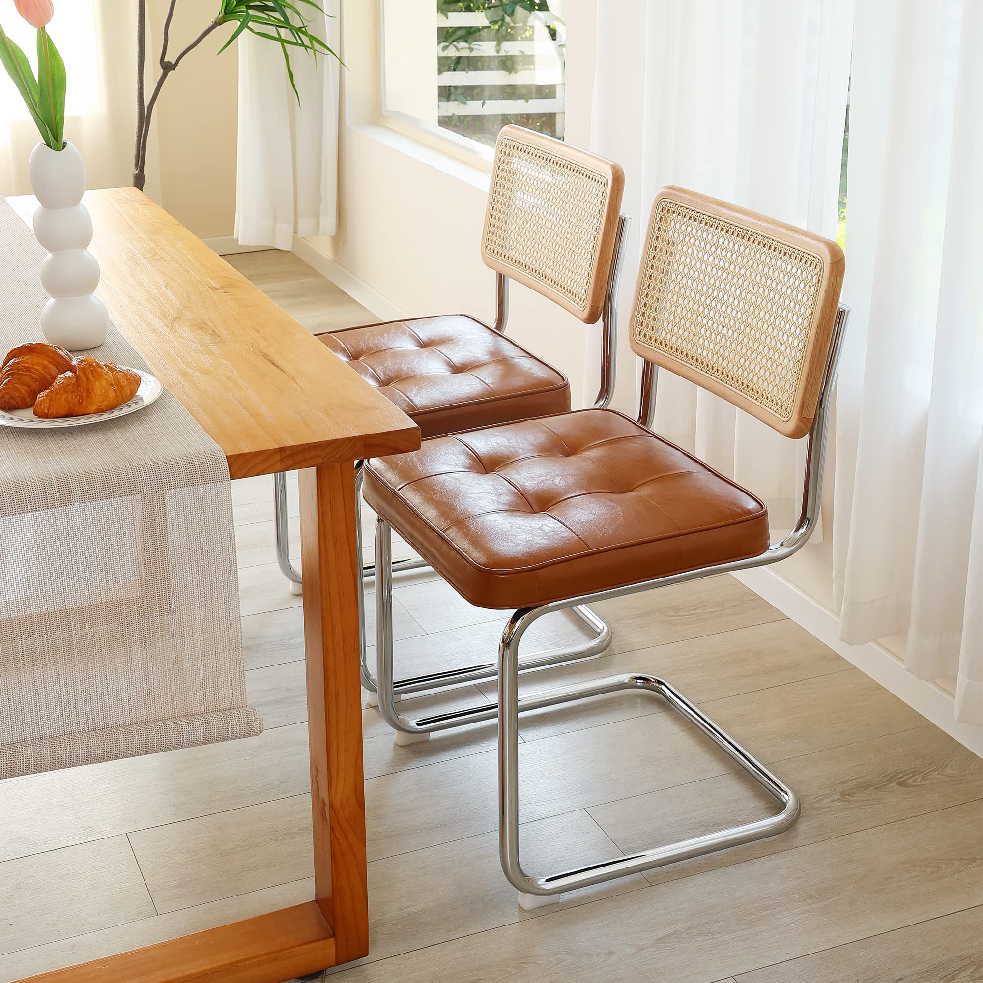 ONEVOG faux leather dining chairs with rattan back